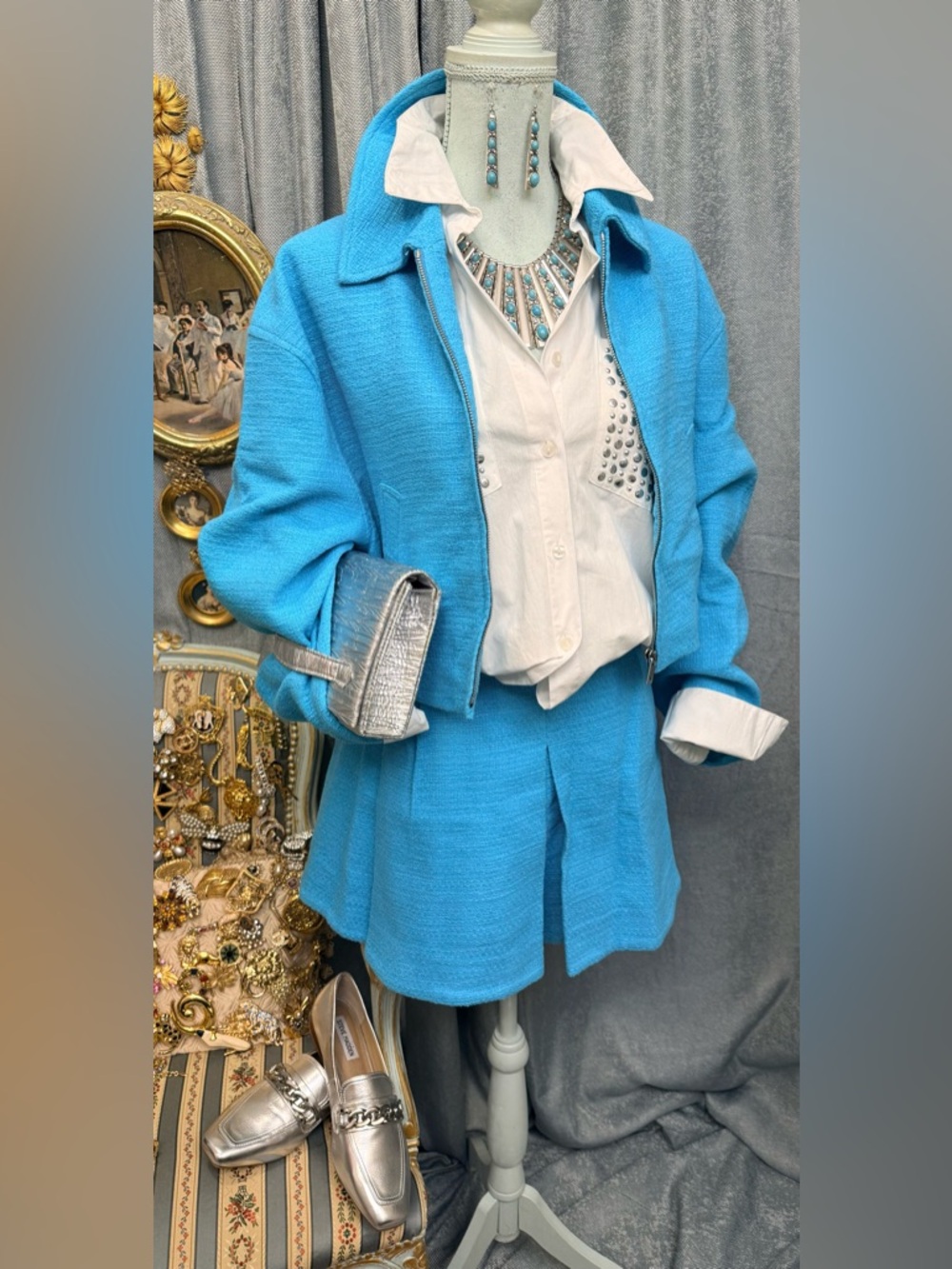 Turquoise Jacket and Skirt Set with White Blouse and Jewelry